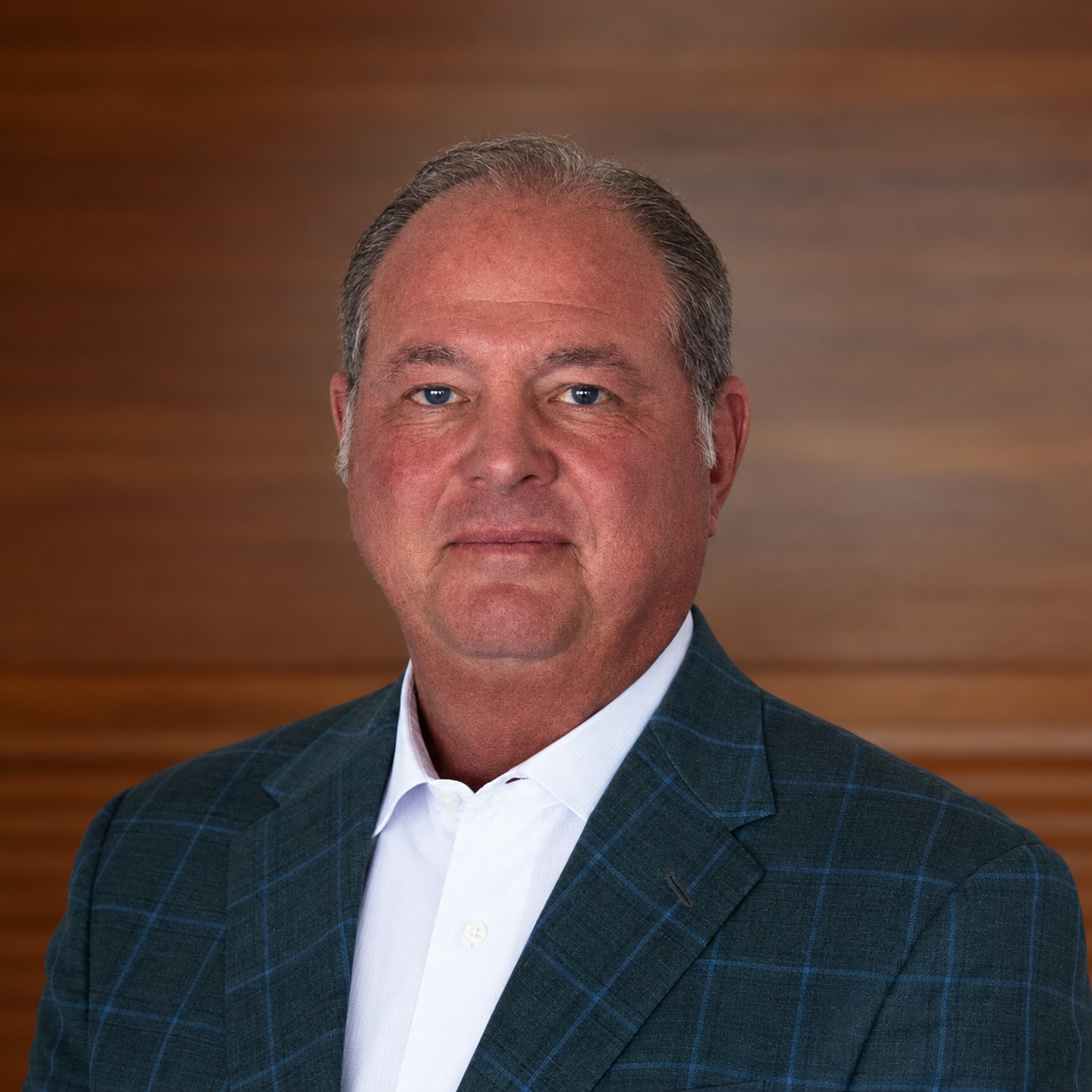 Professional Portrait in Teal Blazer